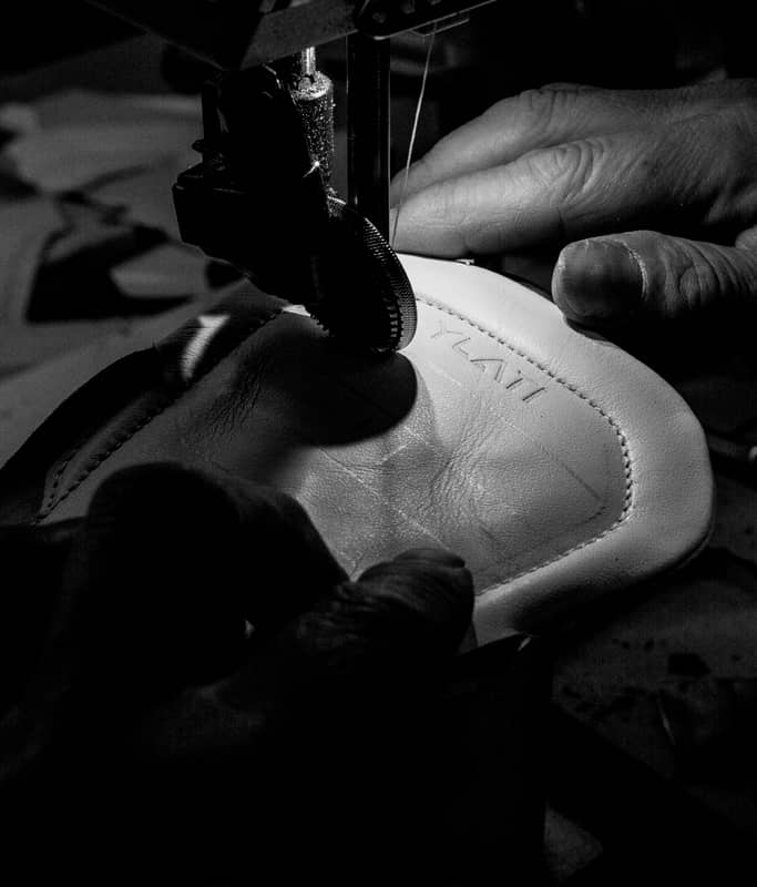 hand stitching  by Italian artisans 